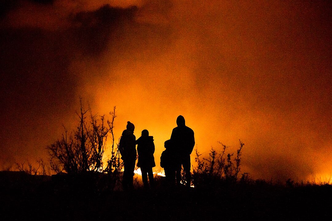 Family watches a wildfire