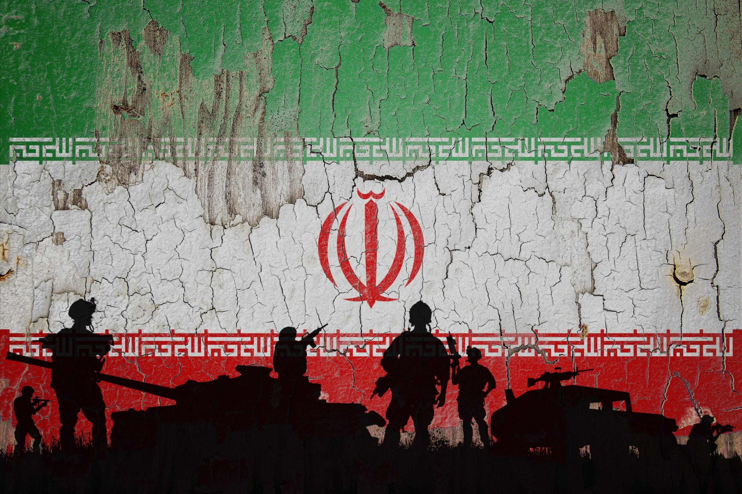 Iran,Flag,Painted,On,The,Cracked,Wall,And,Soldiers,Shadow.