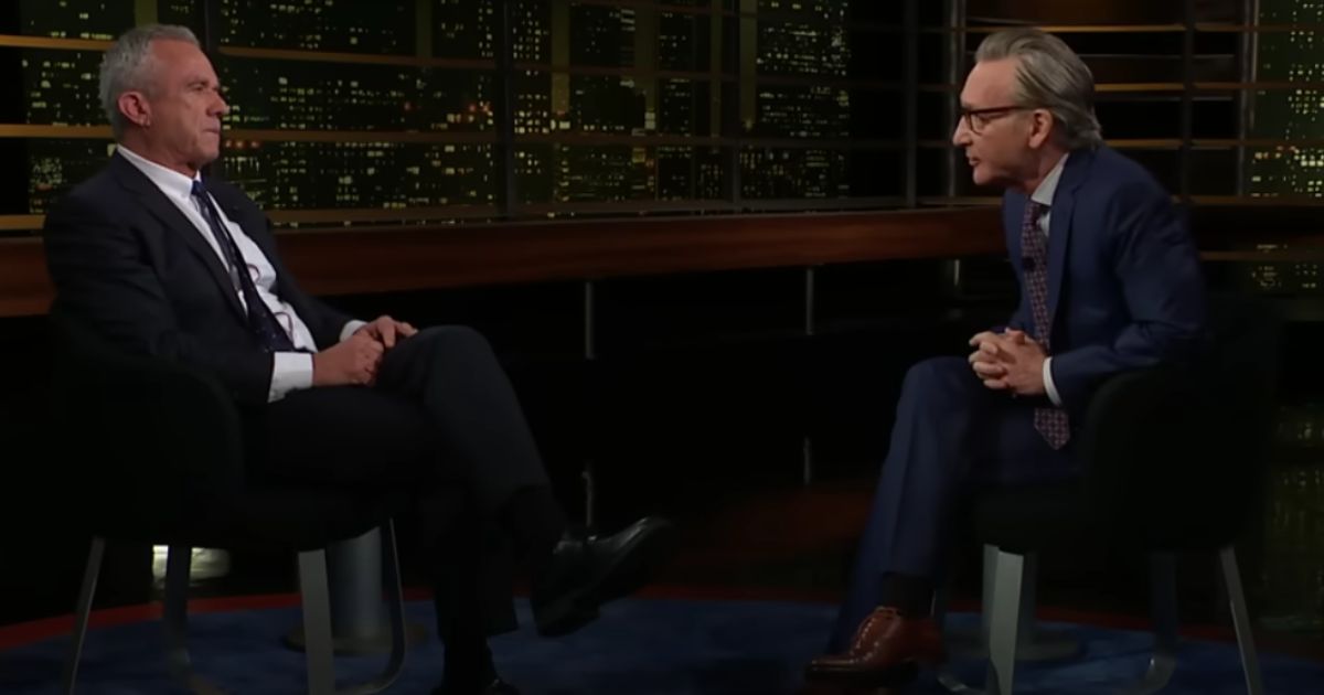 Last April, then-independent presidential candidate Robert Kennedy Jr., left, discussed the COVID vaccine with Bill Maher, right, expressing his belief that the jab doesn't work.