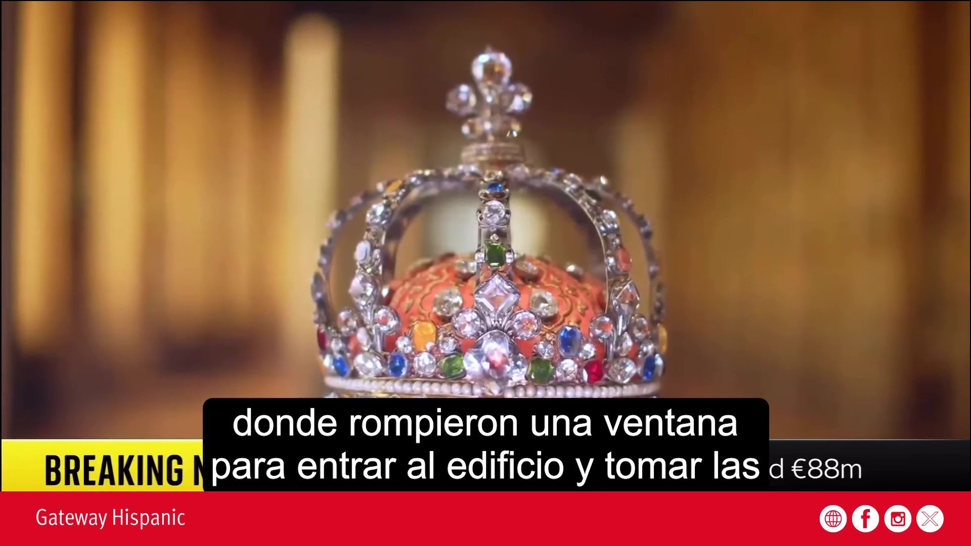 Close-up of an ornate crown featuring colorful gemstones, highlighting its intricate design and craftsmanship against a blurred background.