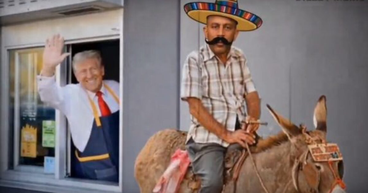 A man wearing a sombrero and mustache rides a donkey while another man waves from a fast-food drive-thru window.