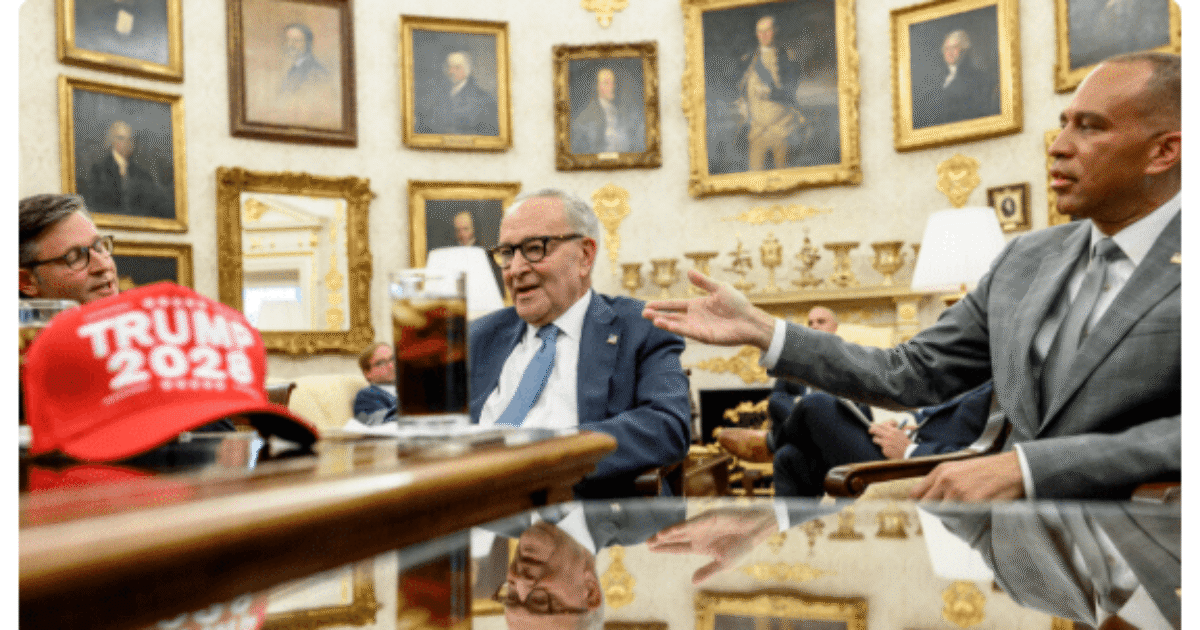 Donald Trump meets with advisors in an ornate room, discussing political strategies, with a red "Trump 2024" hat visible on the table.