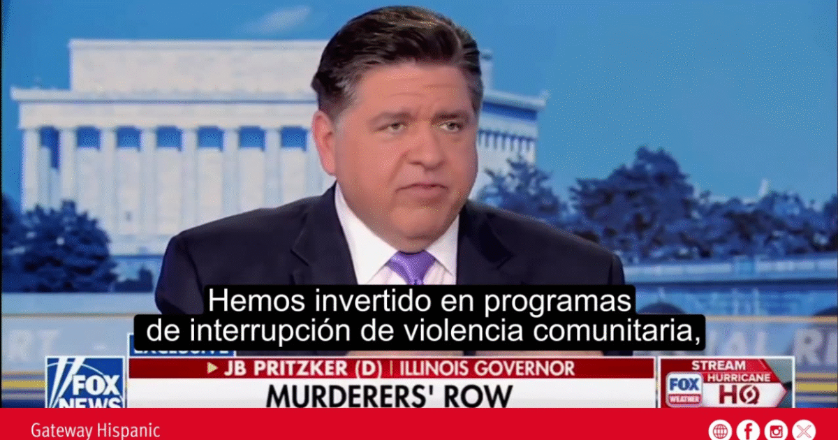 Illinois Governor JB Pritzker discusses community violence interruption programs during a Fox News interview with a backdrop of the Lincoln Memorial.
