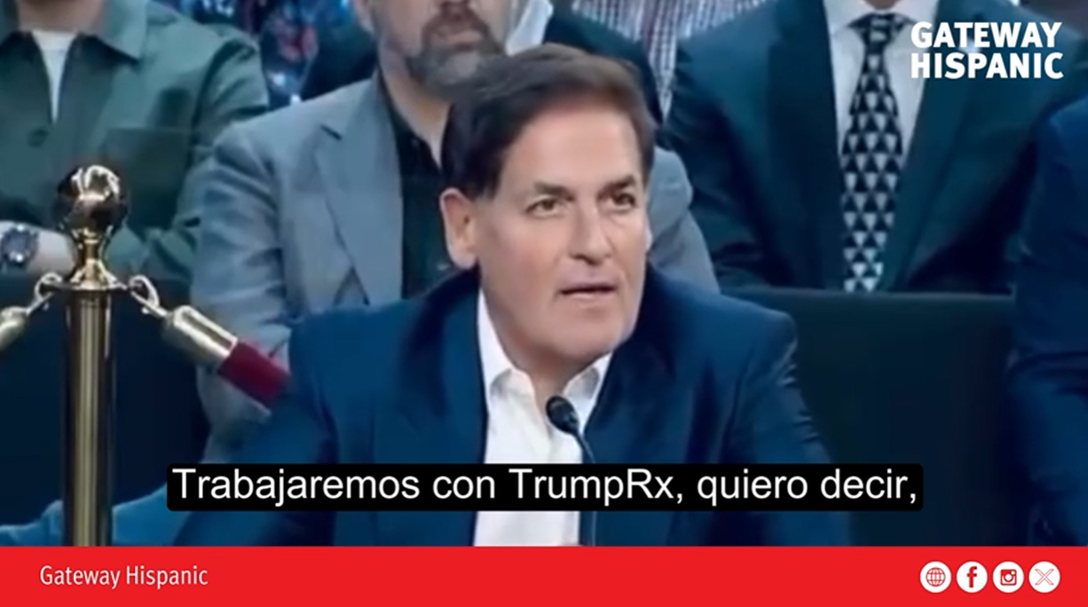 Mark Cuban speaking at a conference, discussing collaboration with TrumpRx, with an audience visible in the background.