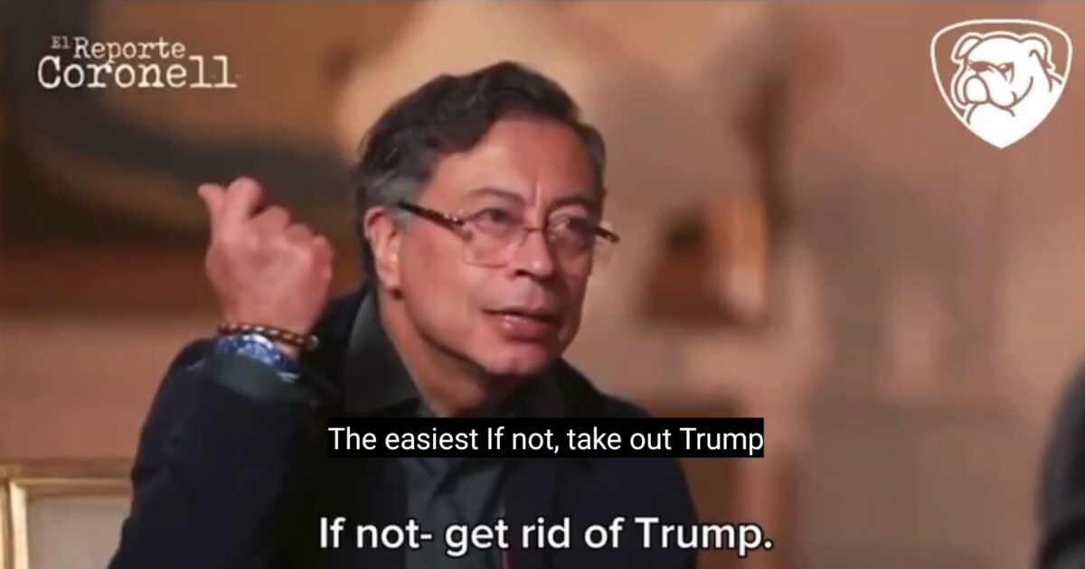 Interview segment featuring a speaker discussing political strategies, with emphasis on actions related to Trump, shown in a blurred background setting.