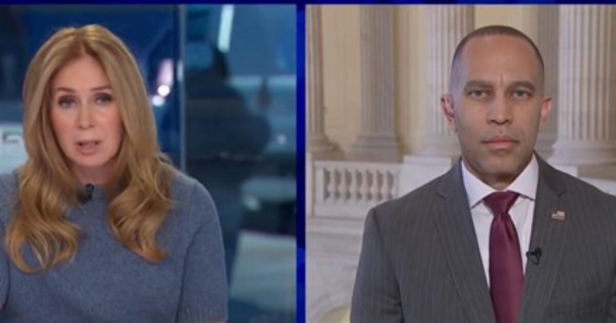 News anchor interviewing a politician, discussing current events, with a backdrop of the Capitol building and a news studio setting.