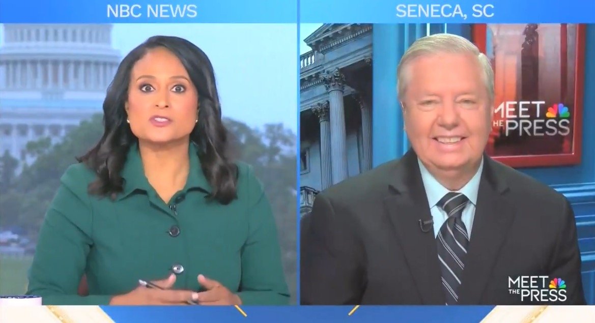 NBC News broadcast featuring a host and a guest discussing current events, with a backdrop of the U.S. Capitol and a graphic for Meet the Press.