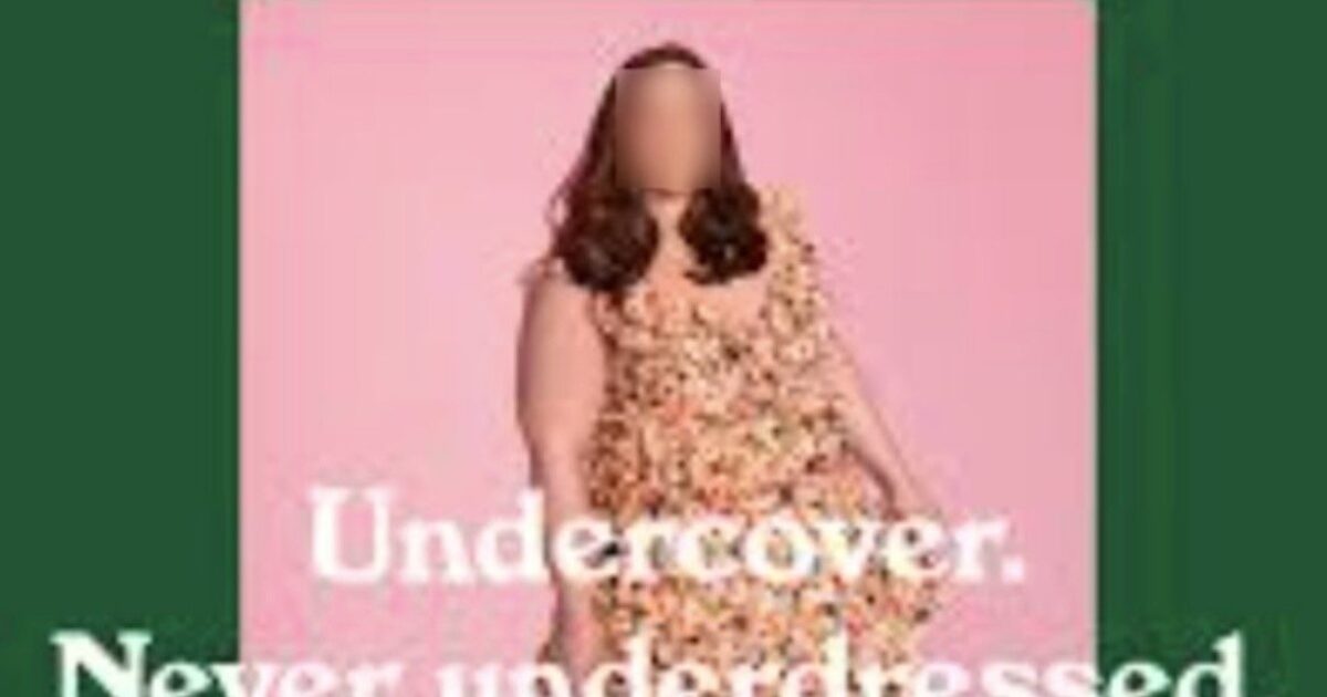 Model wearing a floral dress against a pink background, promoting stylish and confident fashion choices.
