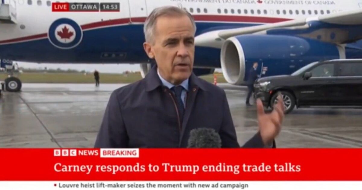 Mark Carney speaks to the media in Ottawa about the impact of Trump ending trade talks, with a Canadian government plane in the background.