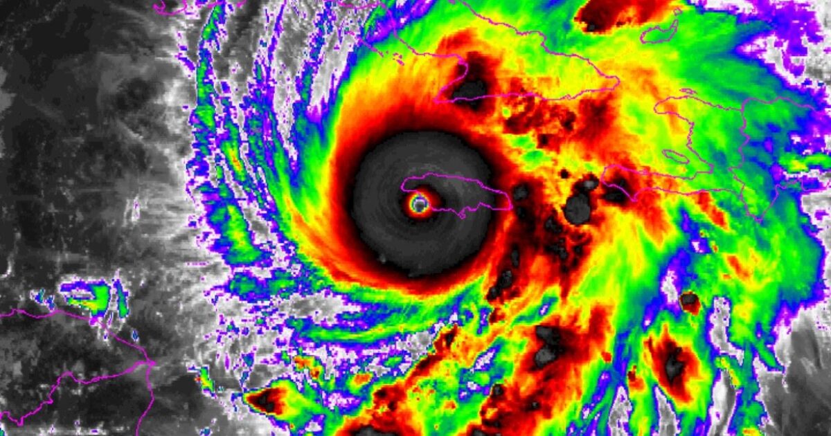 Satellite image of a powerful hurricane approaching Cuba, showcasing vivid colors and swirling clouds indicative of severe weather conditions.