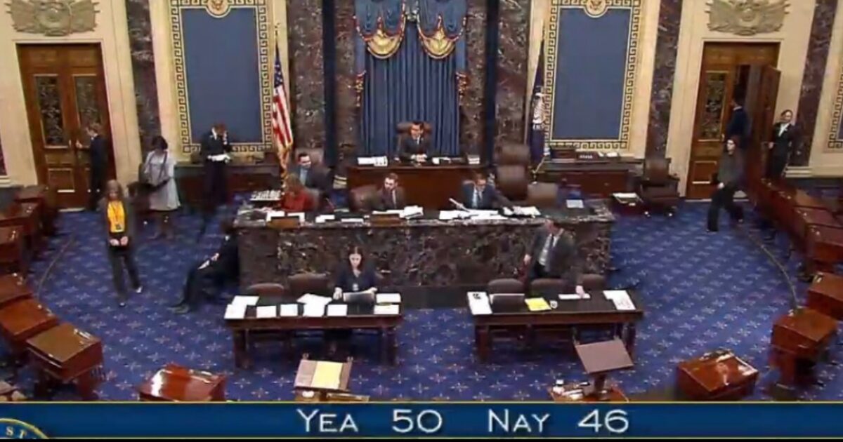 U.S. Senate chamber during a voting session, displaying members seated at desks with a tally of 50 Yea and 46 Nay votes.