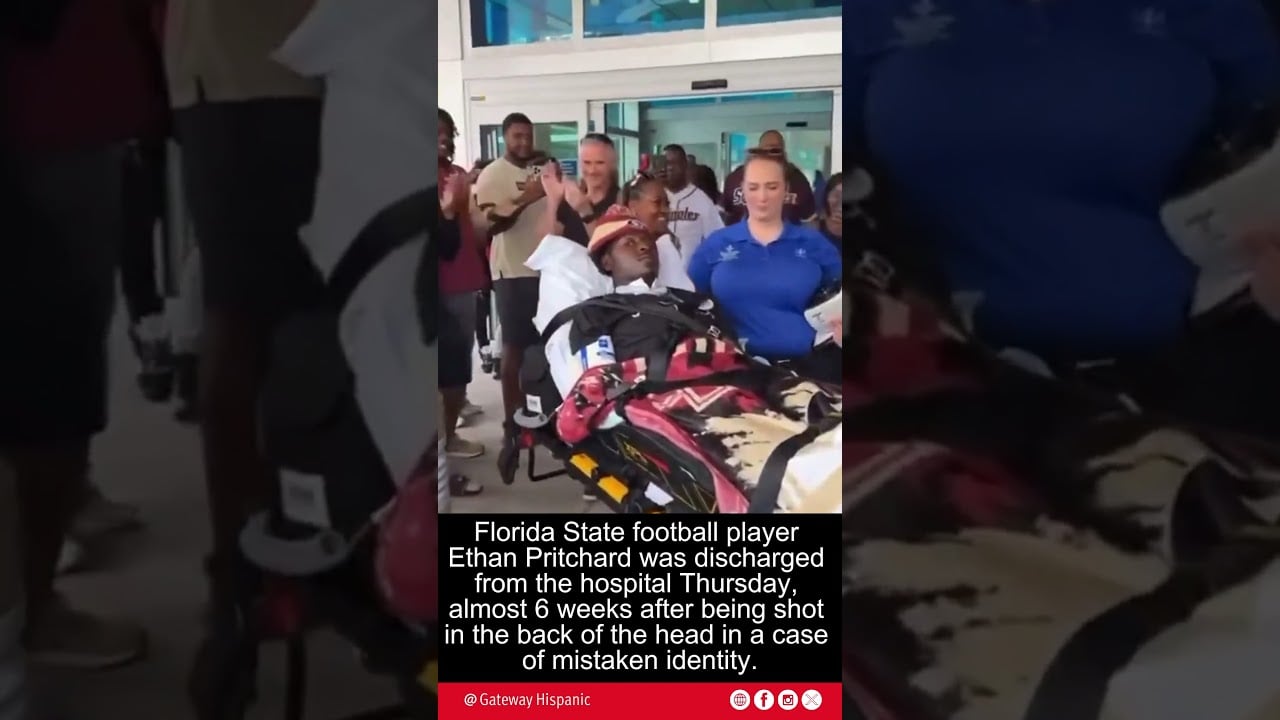 Florida State football player Ethan Pritchard being discharged from the hospital, surrounded by supporters and medical staff after recovering from a serious injury.