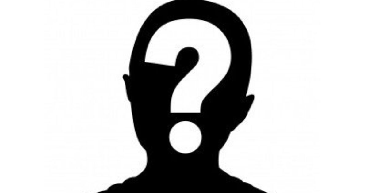 Silhouette of a person with a question mark, symbolizing anonymity and mystery in identity.