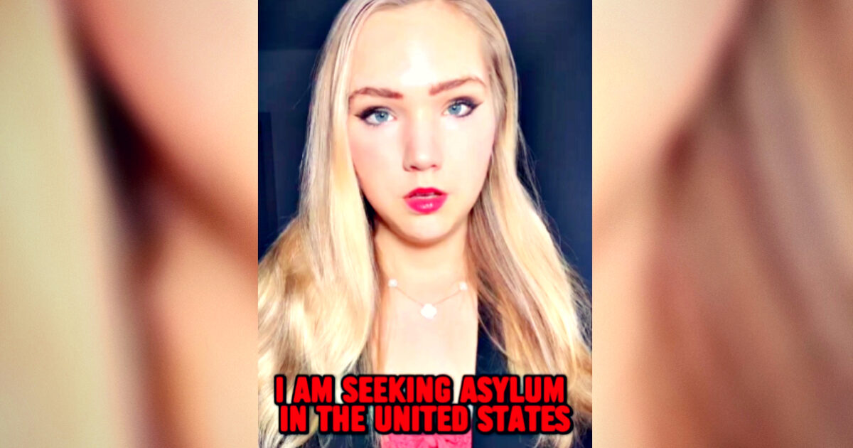 Young woman with long blonde hair and striking makeup expresses her intention to seek asylum in the United States, conveying a serious message.