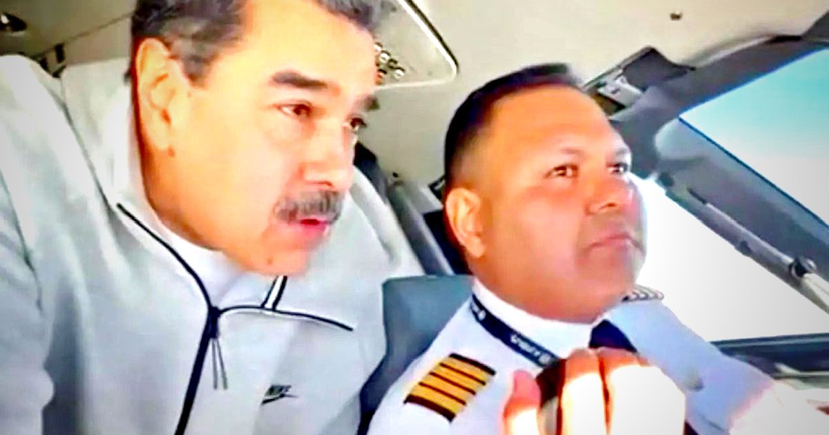 Two men in a cockpit, one engaged in conversation with the pilot, showcasing a moment of collaboration in aviation.