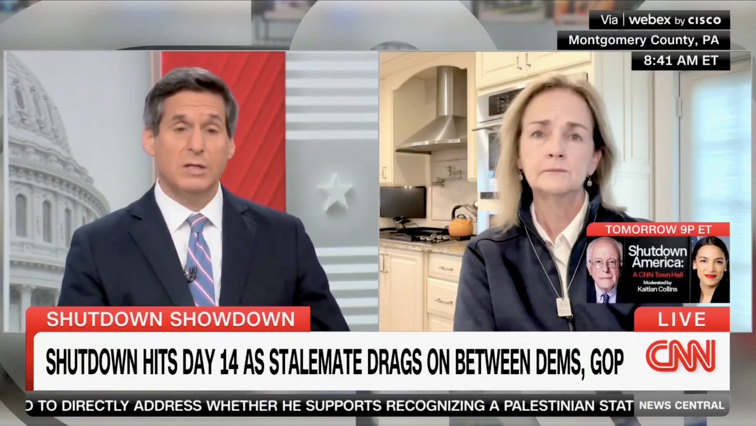CNN hosts discuss the ongoing government shutdown on a live broadcast, highlighting the 14th day of the stalemate between Democrats and Republicans.
