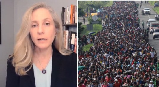 Woman speaking on immigration issues alongside a large crowd of migrants walking along a road, highlighting the ongoing migration crisis.