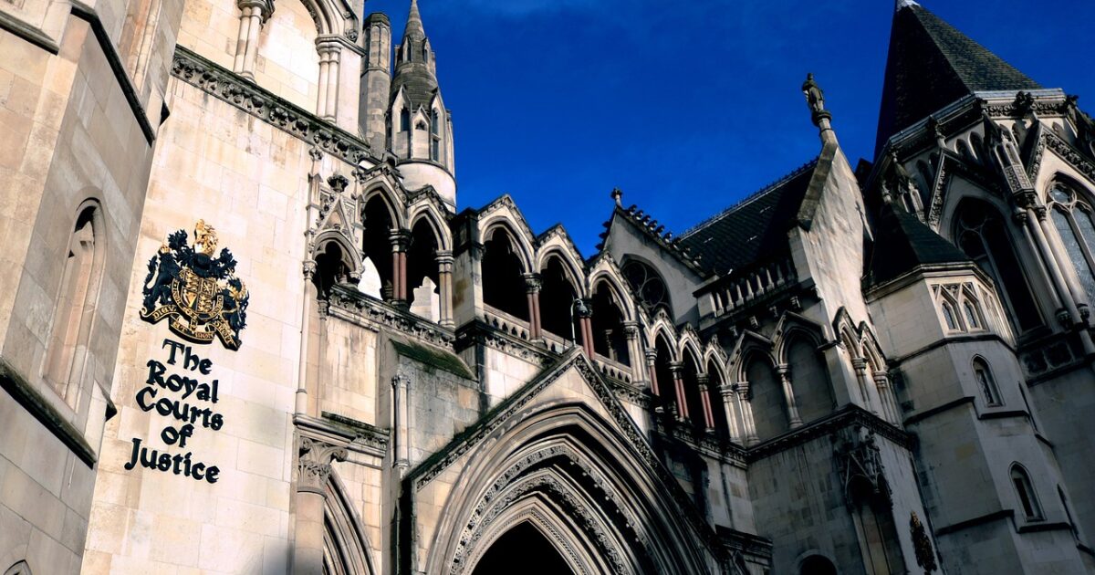 The Royal Courts of Justice, an iconic Gothic-style building in London, showcases intricate architecture and serves as a key venue for legal proceedings.
