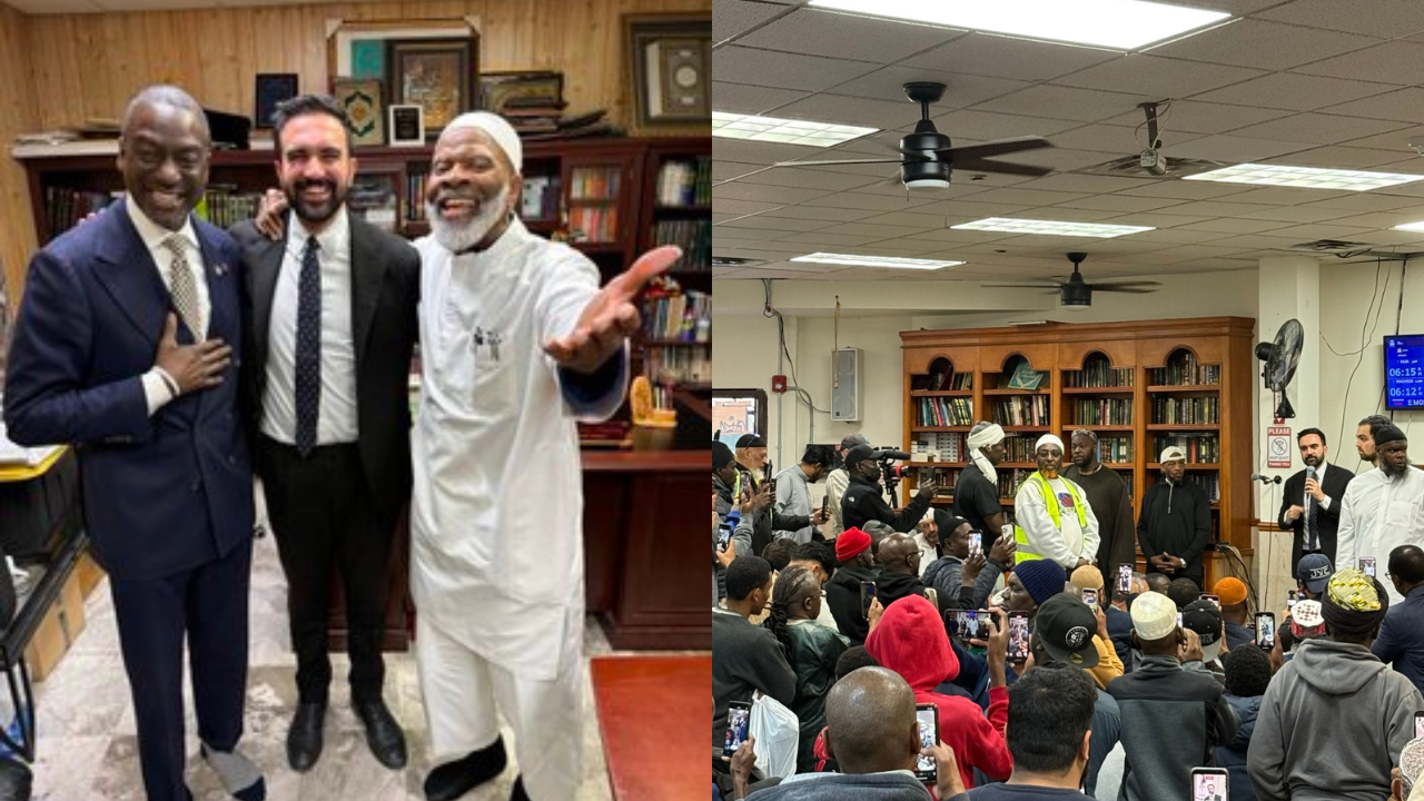 Group of men smiling together in an office setting, with a crowd gathered in a community space, highlighting engagement and connection among diverse individuals.