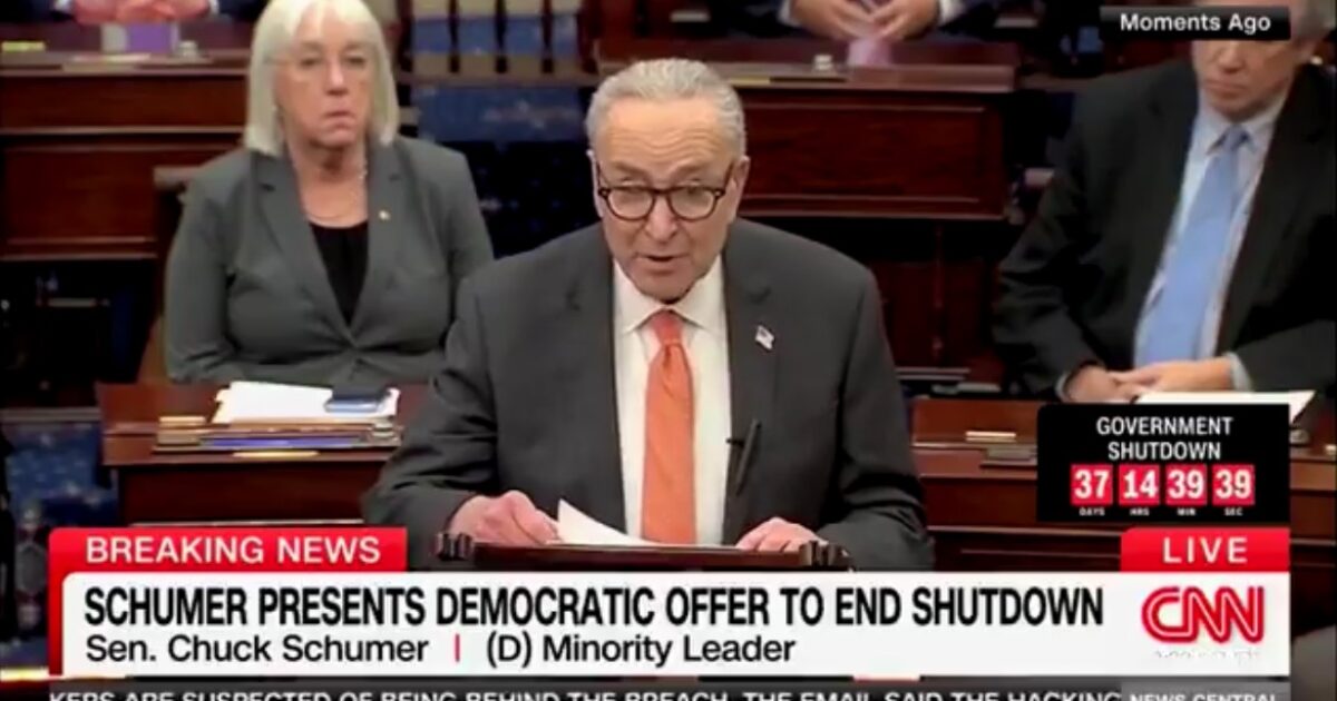 Senator Chuck Schumer addresses the Senate, presenting a Democratic proposal to resolve the ongoing government shutdown, with colleagues and a live countdown in the background.