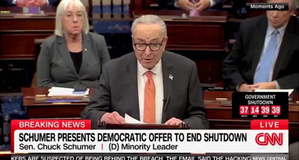 Senator Chuck Schumer addresses the Senate, presenting a Democratic proposal to resolve the ongoing government shutdown, with colleagues and a live countdown in the background.