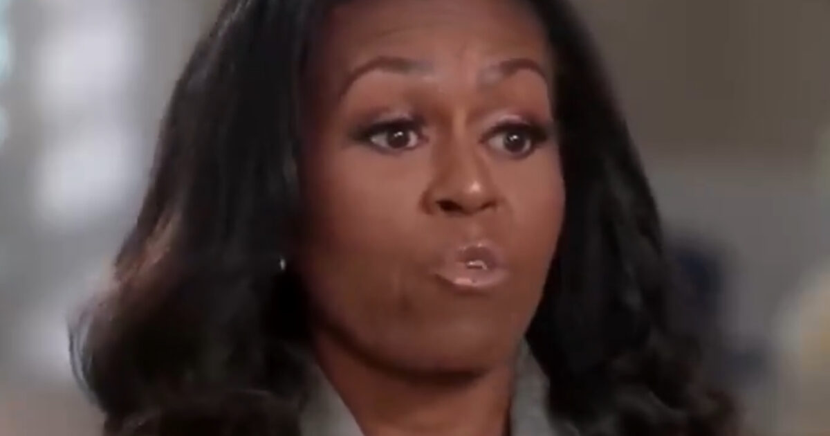 Michelle Obama speaking passionately during an interview, showcasing her expressive facial features and stylish attire.