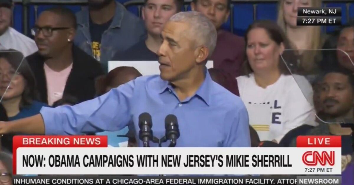 Barack Obama speaks at a campaign event in Newark, New Jersey, alongside Mike Sherrill, engaging with a diverse audience.