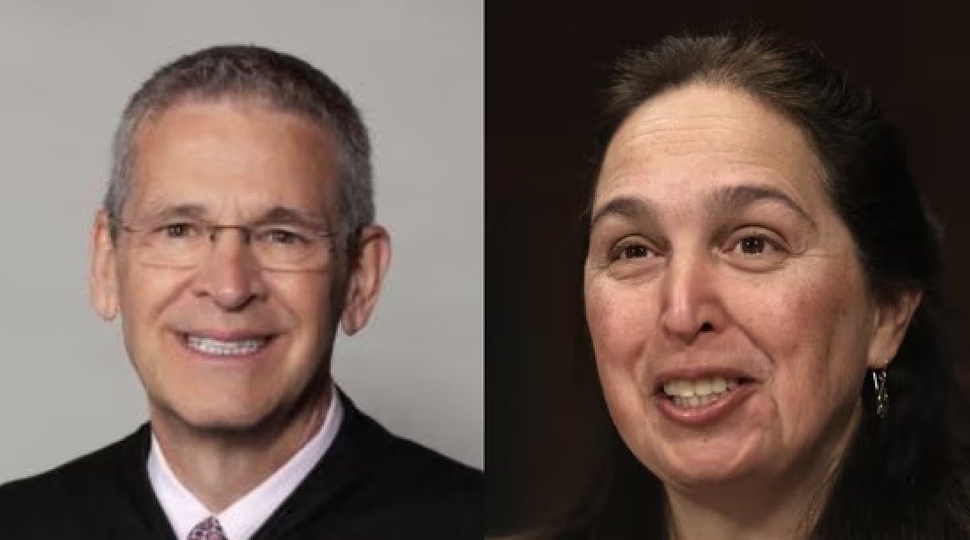 Portrait of two judges smiling, showcasing their professionalism and approachability in a legal context.