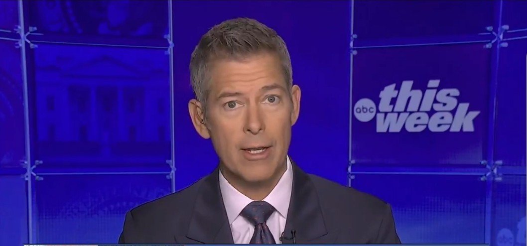 News anchor presenting on ABC's This Week, featuring a professional setting with a blue backdrop and the show's logo prominently displayed.