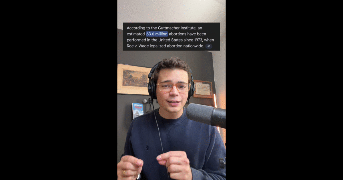 Young man discussing abortion statistics and Roe v. Wade in a podcast setting, wearing headphones and gesturing to emphasize key points.