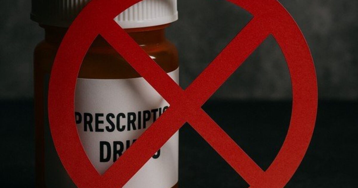 Prescription drug bottle with a red prohibition sign, symbolizing the dangers of misuse and the importance of responsible medication practices.